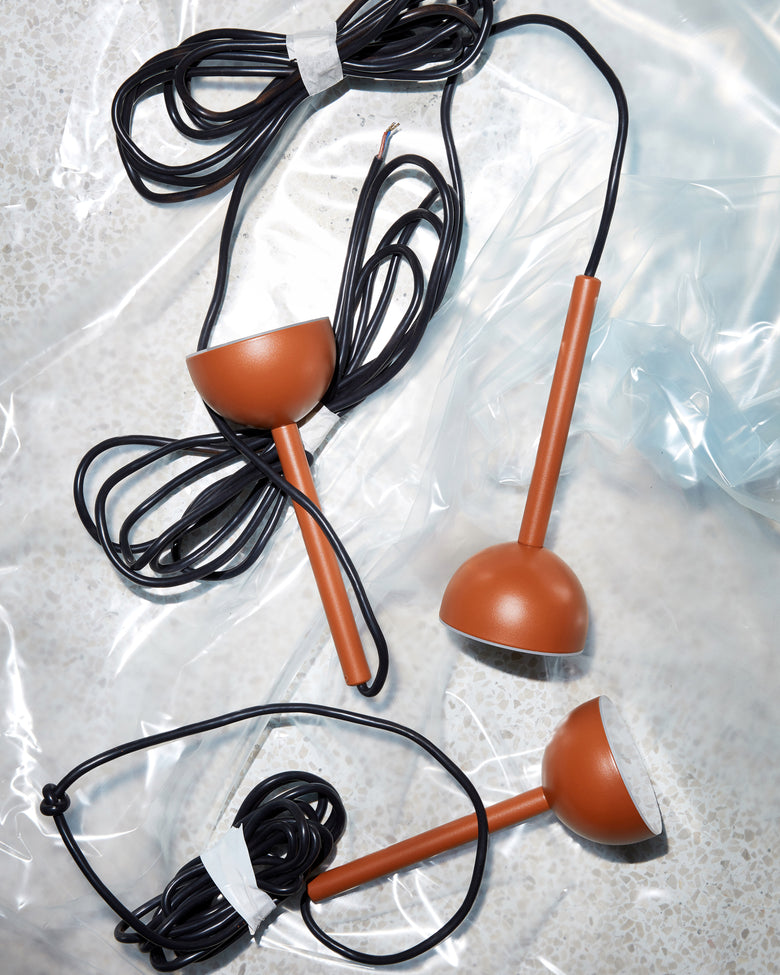 Blush pendant rust floor Photo Chris Tonnesen