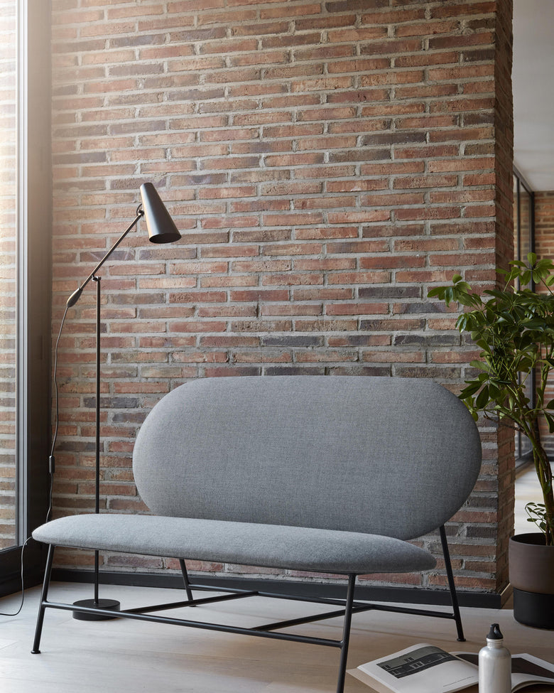 Oblong sofa grey closer Photo Chris Tonnesen