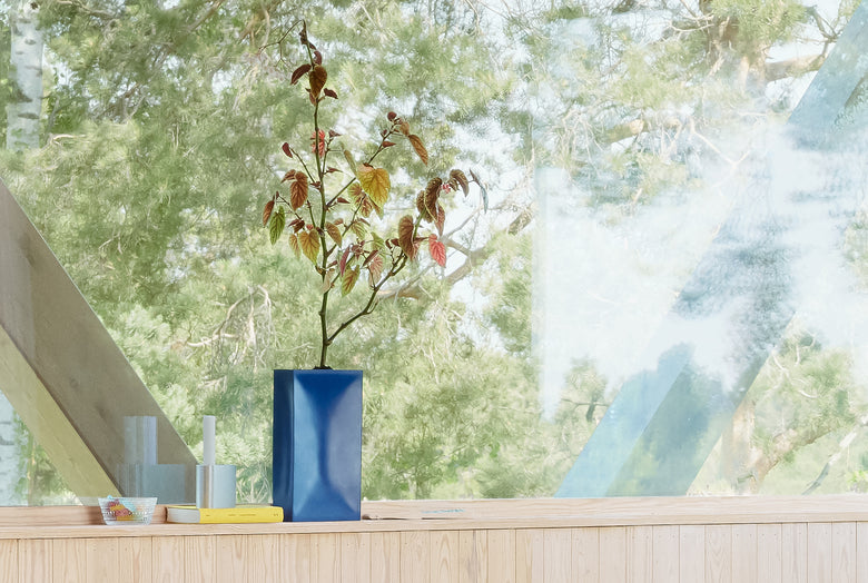 Into vase blue landscape Ph Sara Spilling