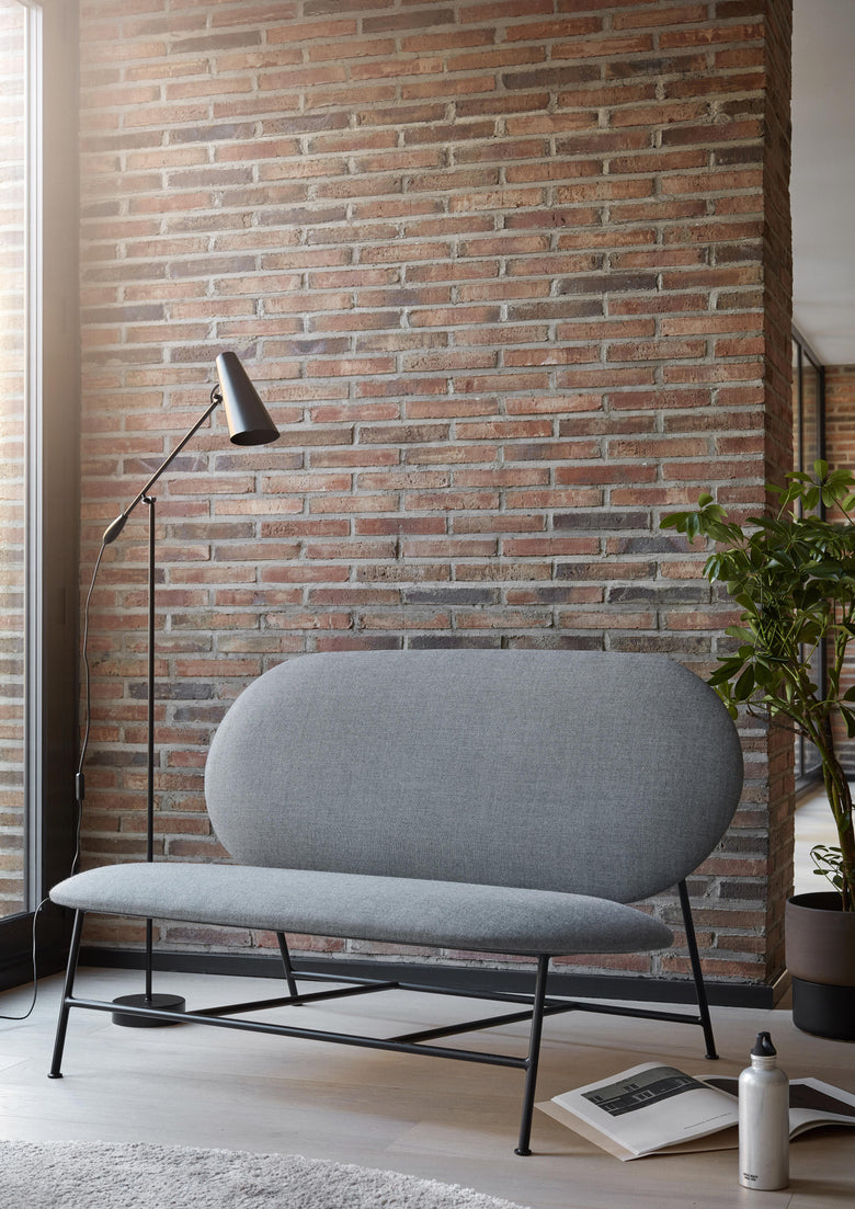 Oblong sofa grey closer Photo Chris Tonnesen