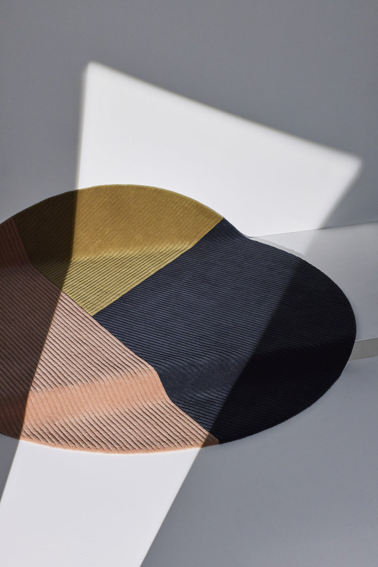 Row rug circular trio