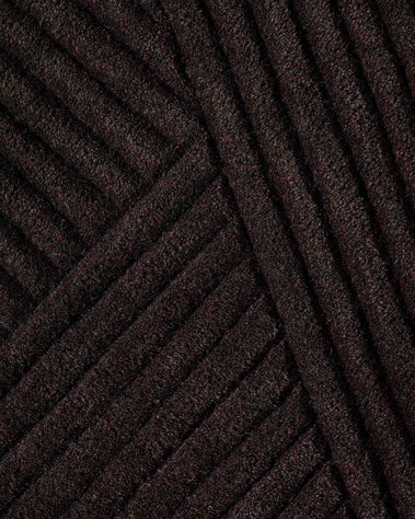 Row rug brown detail photo Chris Tonnesen-Low-res a65853c7-ce47-47aa-a5de-cd9185efc23b