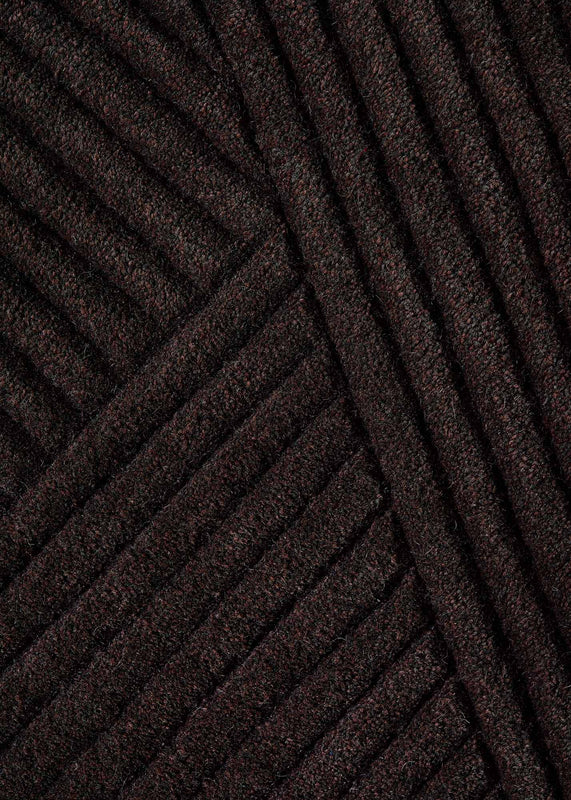 Row rug brown detail photo Chris Tonnesen