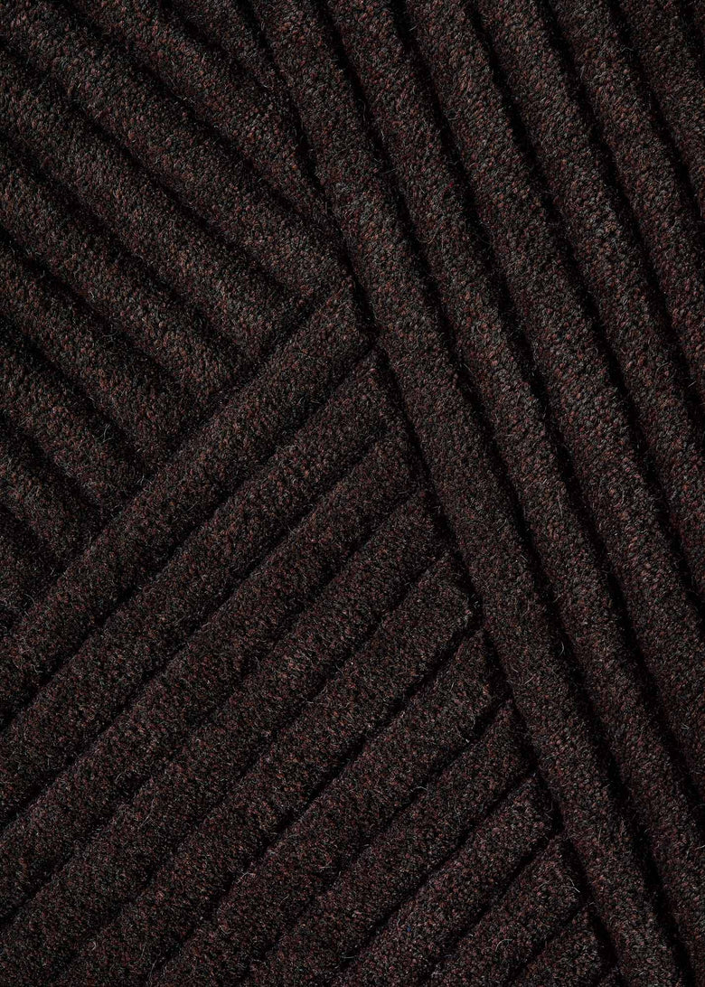 Row rug brown detail photo Chris Tonnesen